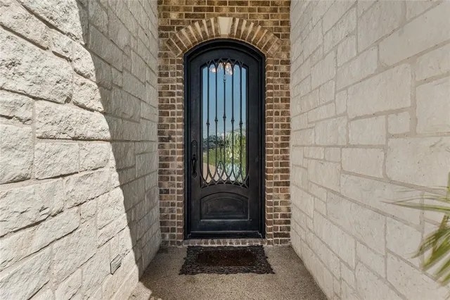 a view of entrance gate of a house