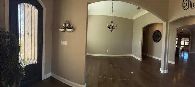 a view of room with furniture and window