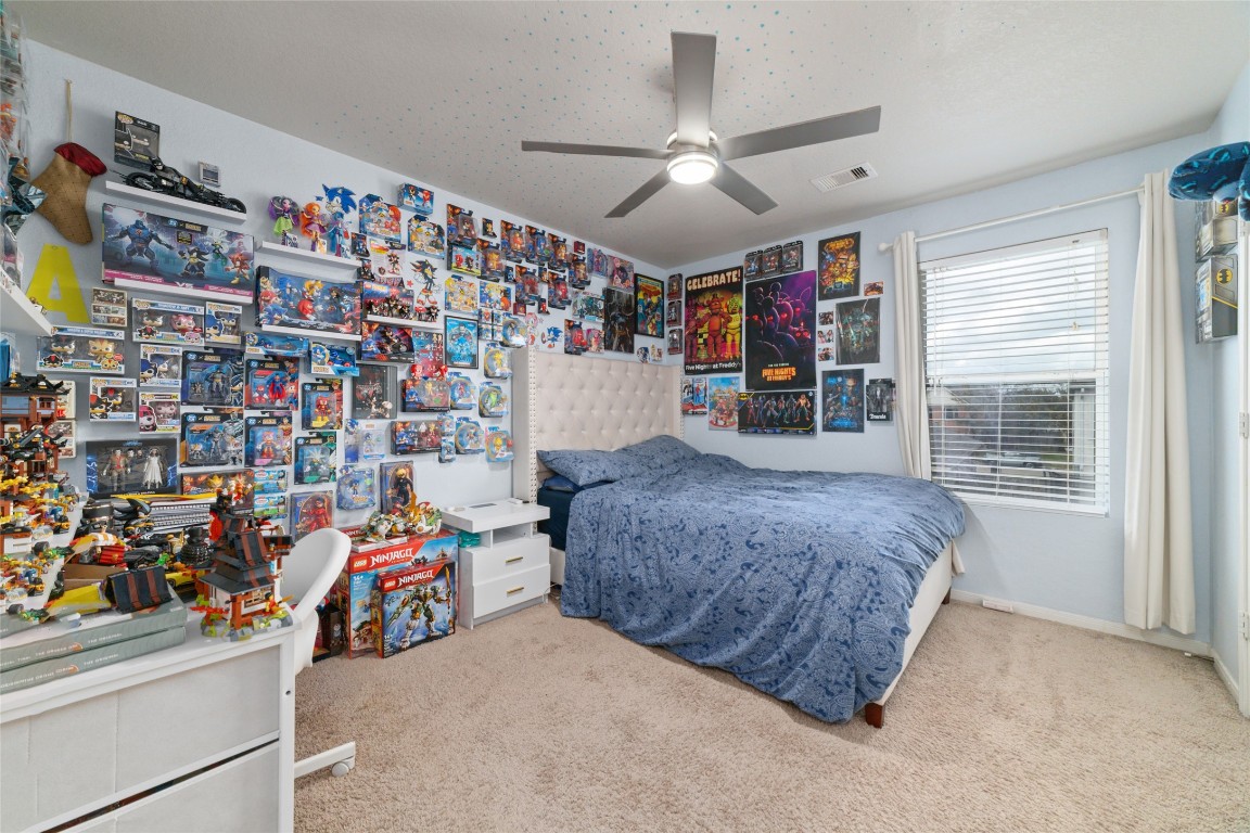 3038 Winchester Rnch Trail Katy, TX 77493 - Photo 26 of 29 a bed room with a bed and a window