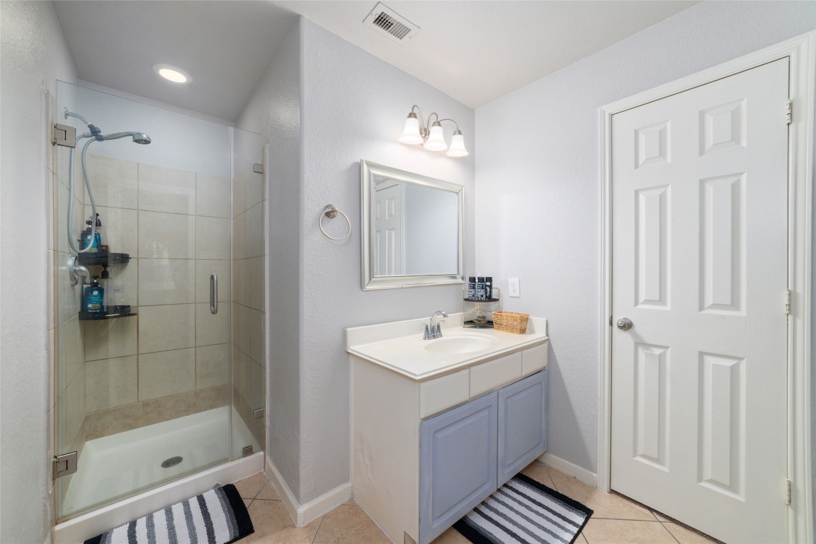 3038 Winchester Rnch Trail Katy, TX 77493 - Photo 27 of 29 a bathroom with a sink a toilet and shower