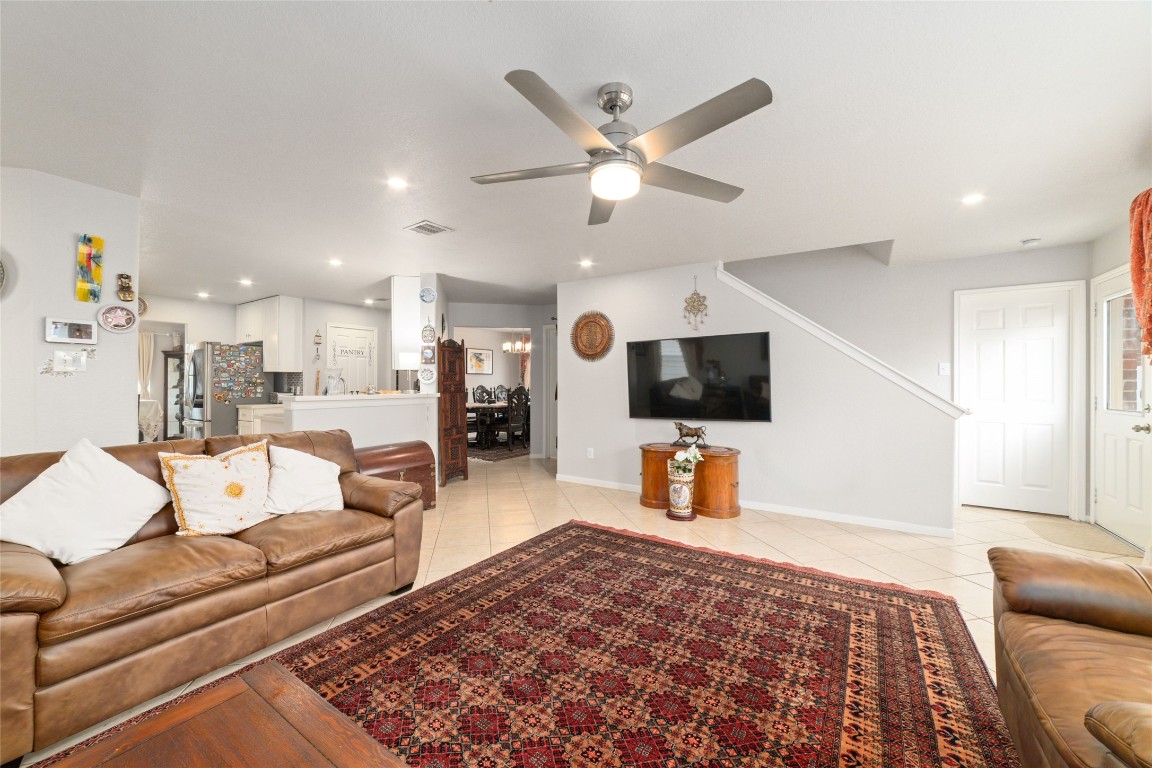 3038 Winchester Rnch Trail Katy, TX 77493 - Photo 8 of 29 a living room with furniture and a flat screen tv
