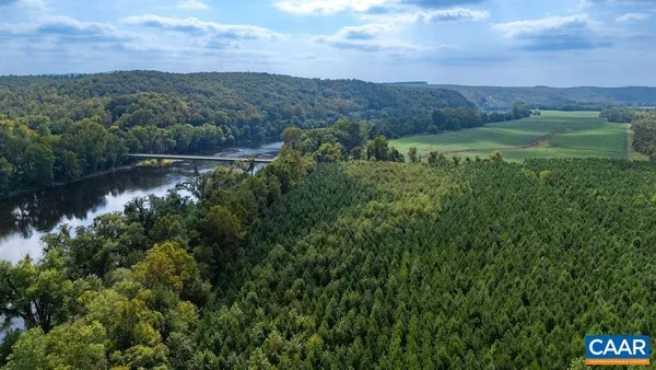 a view of a lake with a yard