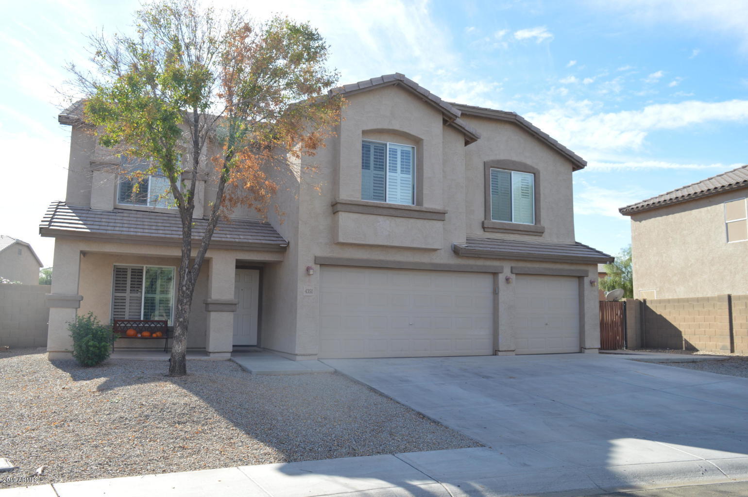 4351 East Pinto Valley Road San Tan Valley, AZ 85143 - Photo 1 of 27 a front view of a house with a yard and garage
