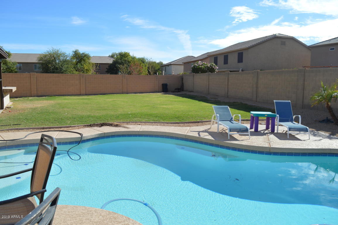 4351 East Pinto Valley Road San Tan Valley, AZ 85143 - Photo 24 of 27 a view of backyard with trampoline