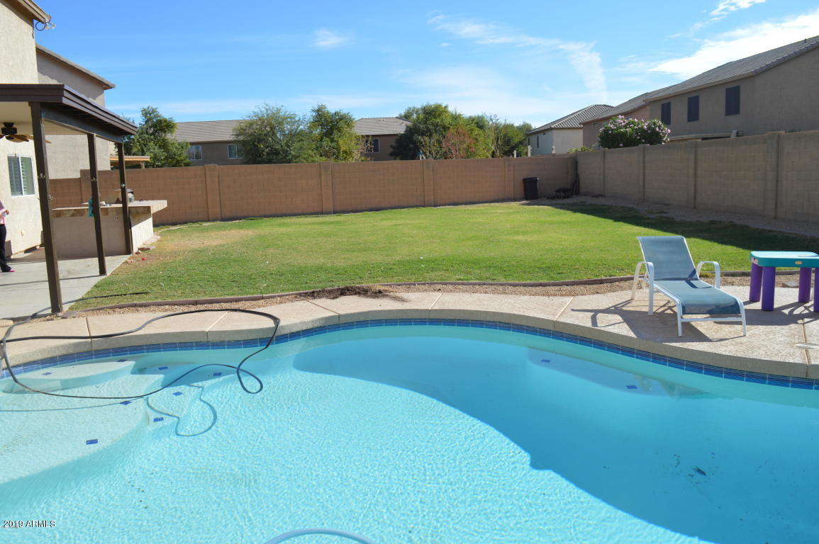 4351 East Pinto Valley Road San Tan Valley, AZ 85143 - Photo 25 of 27 a view of a backyard with swimming pool