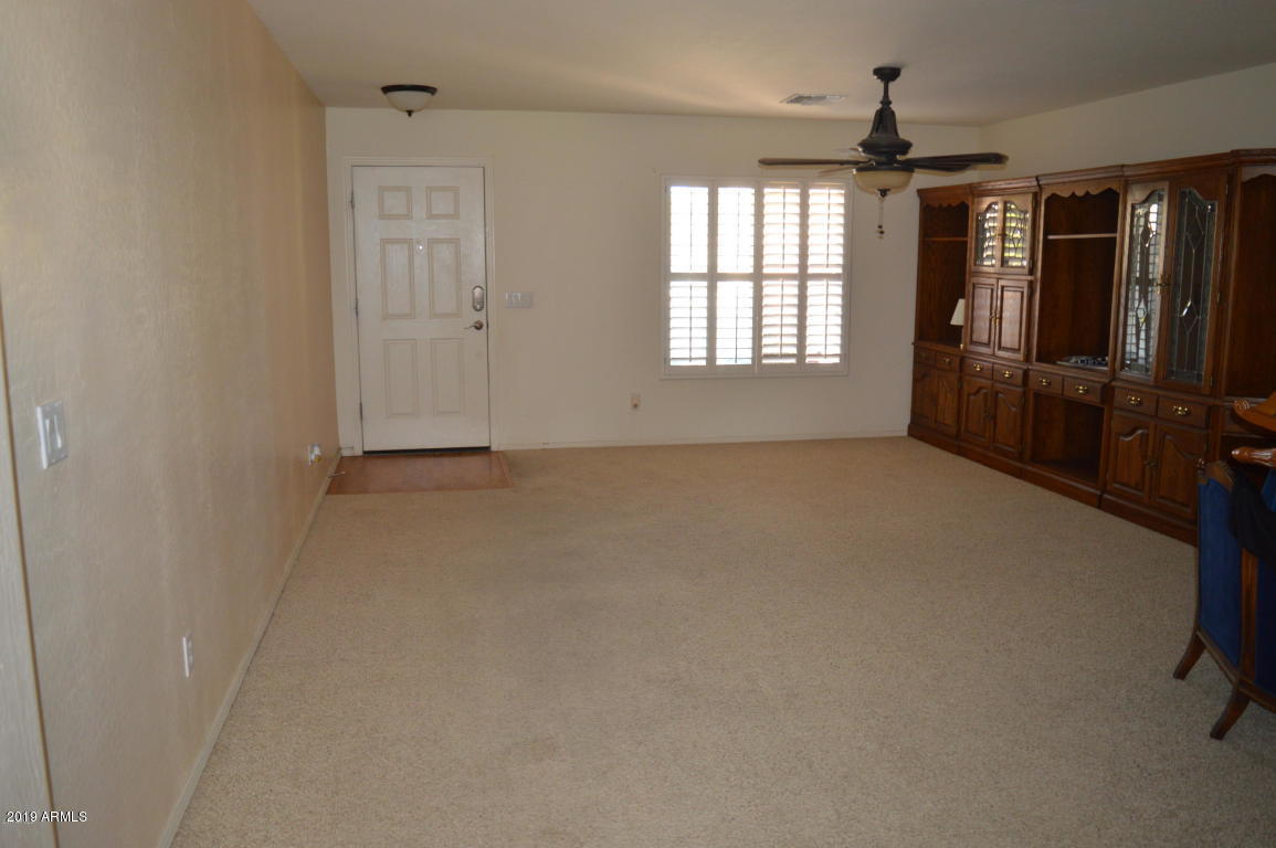 4351 East Pinto Valley Road San Tan Valley, AZ 85143 - Photo 3 of 27 an empty room with windows