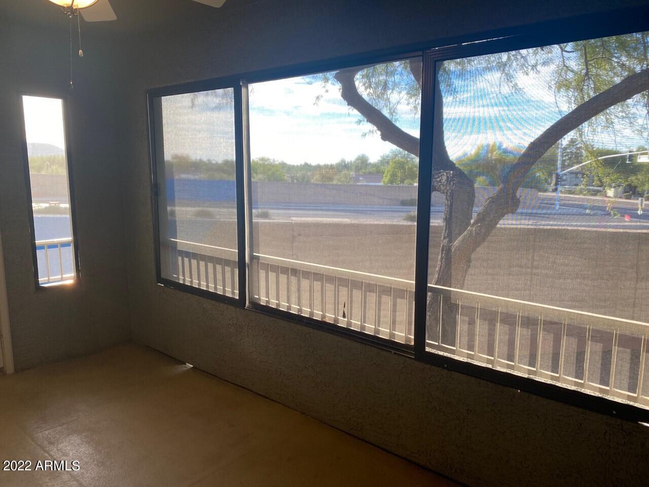15225 North 100th Street, Unit 2188 Scottsdale, AZ 85260 - Photo 18 of 24 a view of an empty room with a window