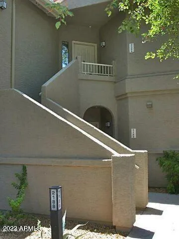 a vase of flowers sitting on a table
