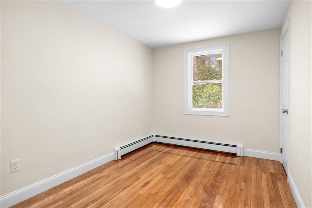36 Grove Street Hanover, MA 02339 - Photo 14 of 25 an empty room with a window