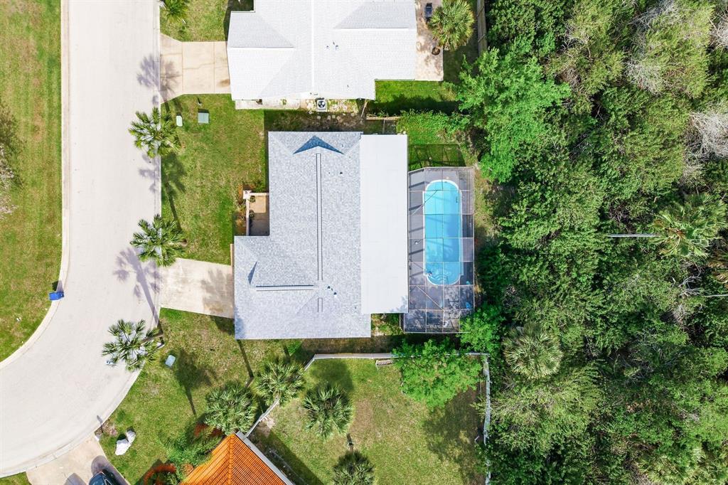 4276 Rudder Way New Port Richey, FL 34652 - Photo 25 of 29 an aerial view of a house with a yard
