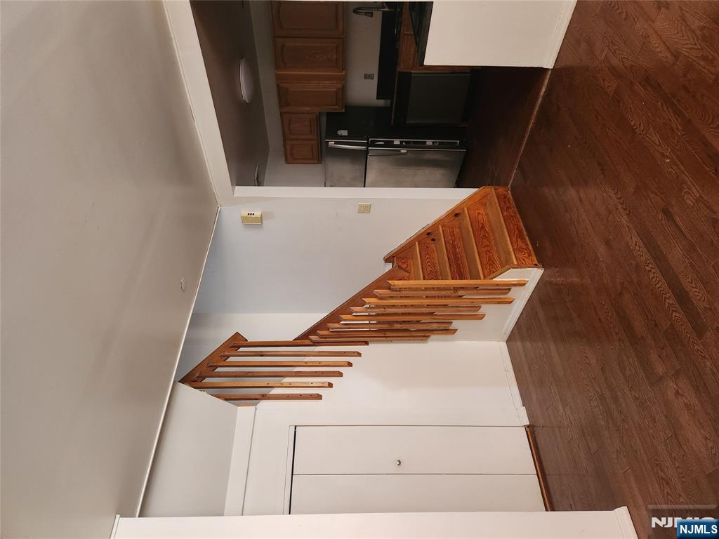 840 River Road, Unit B2 Edgewater, NJ 07020 - Photo 11 of 13 a view of entryway and hall with wooden floor