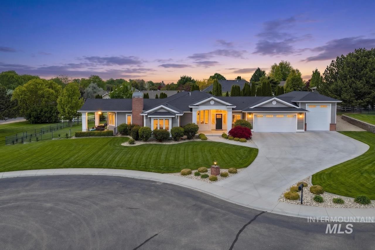 15254 Bald Eagle Avenue Caldwell, ID 83607 - Photo 1 of 1 Ranch-style exterior with gray siding, white trim, and a dark roof