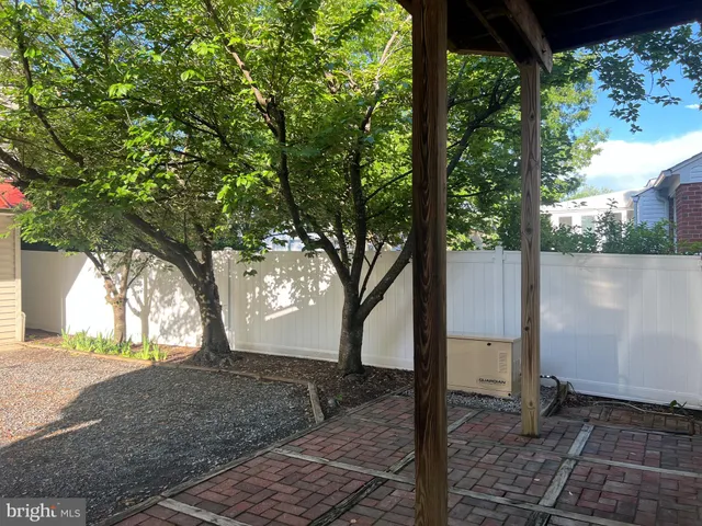 a kitchen with a sink cabinets and stainless steel appliances