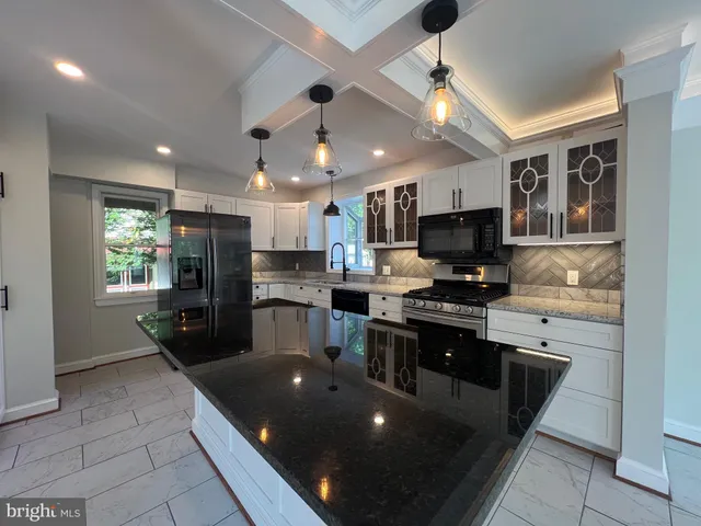 a view of a wooden deck and a garden