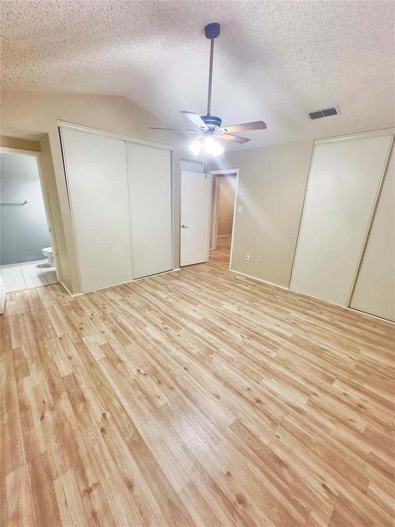 7401 Canoga Circle Fort Worth, TX 76137 - Photo 5 of 17 a view of an empty room with a chandelier