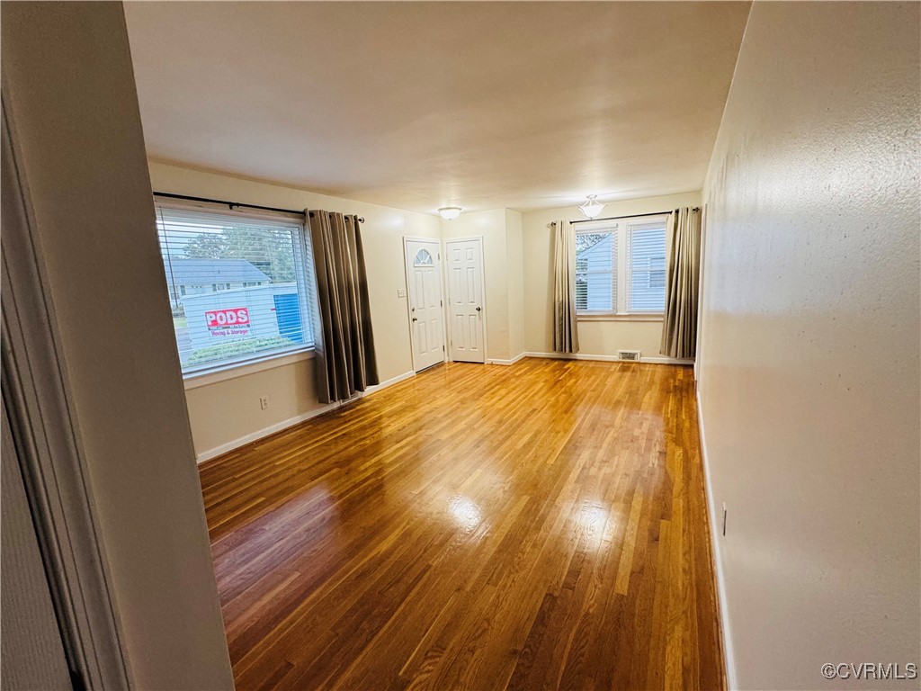 2708 Elgin Road Richmond, VA 23223 - Photo 2 of 8 Great room with wood finished floors, healthy amou