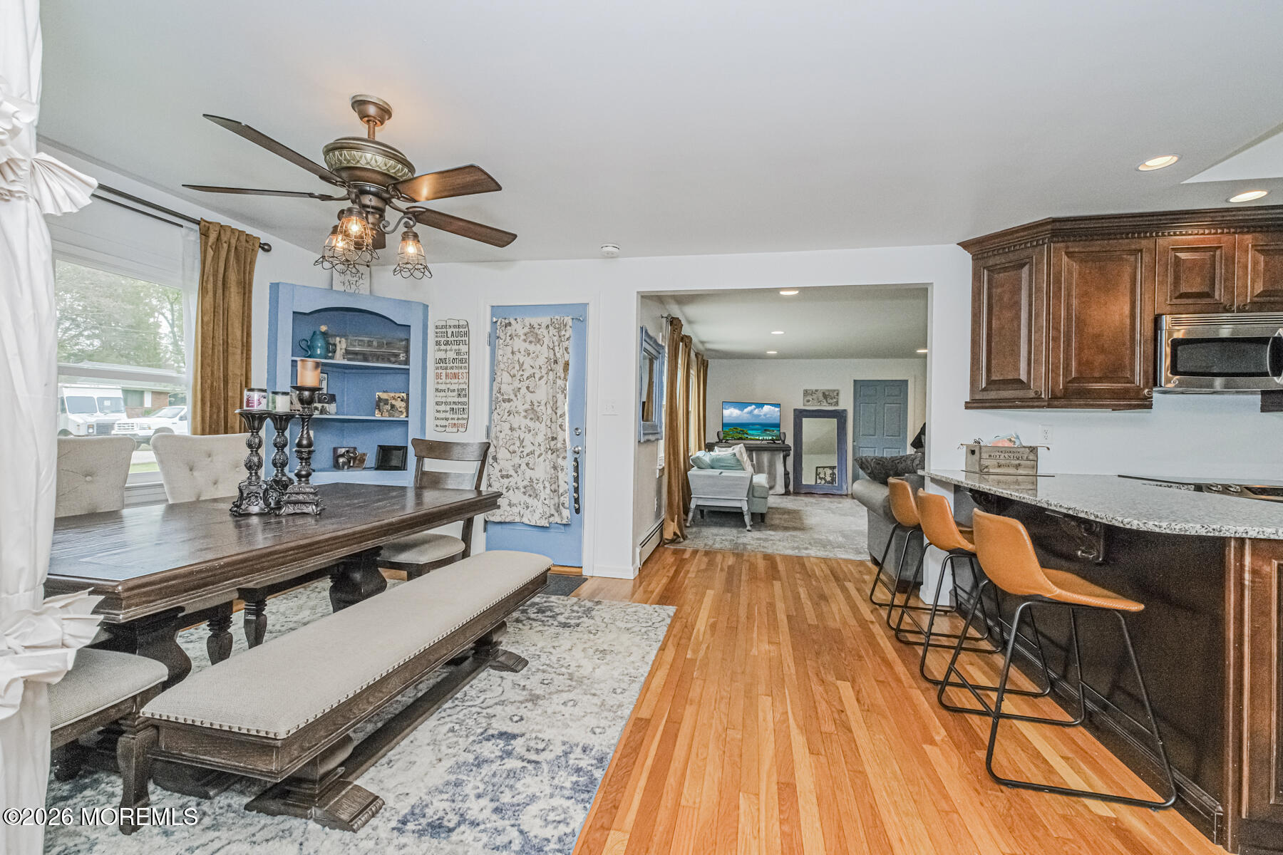 5 Riccis Drive Jackson, NJ 08527 - Photo 8 of 32 a dining hall with stainless steel appliances granite countertop a stove and a sink