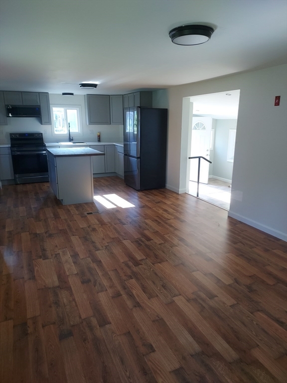 13 Daisy Avenue Taunton, MA 02780 - Photo 17 of 22 a view of a kitchen with a sink and a window