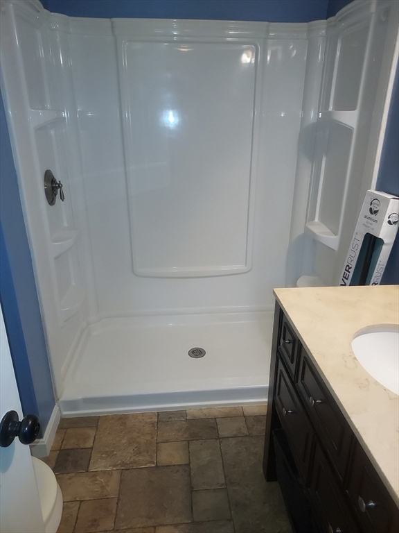 13 Daisy Avenue Taunton, MA 02780 - Photo 18 of 22 a bathroom with a sink a toilet and shower