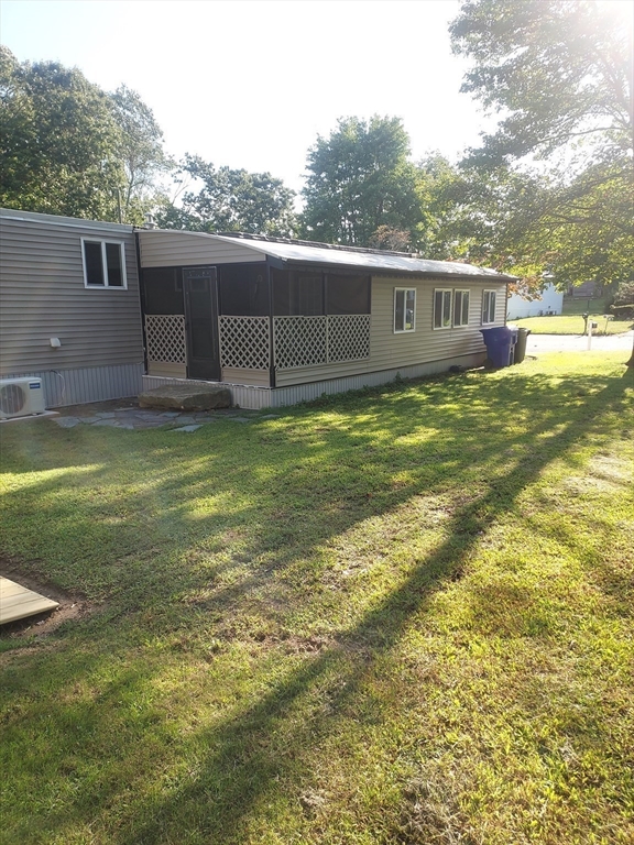 13 Daisy Avenue Taunton, MA 02780 - Photo 3 of 22 a backyard of a house