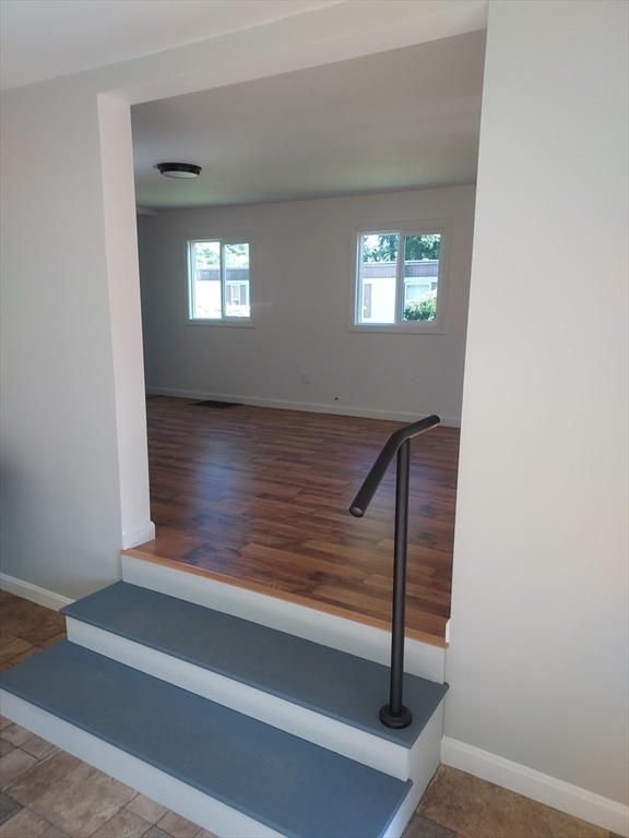 13 Daisy Avenue Taunton, MA 02780 - Photo 9 of 22 a view of wooden floor and windows in a room