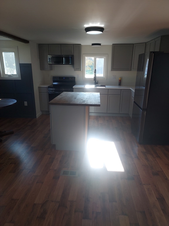 13 Daisy Avenue Taunton, MA 02780 - Photo 10 of 22 a kitchen with counter top space cabinets and appliances