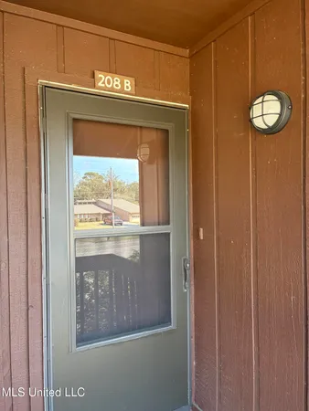 $130,300 | 208 Molokai, Unit B, Diamondhead, MS 39525
