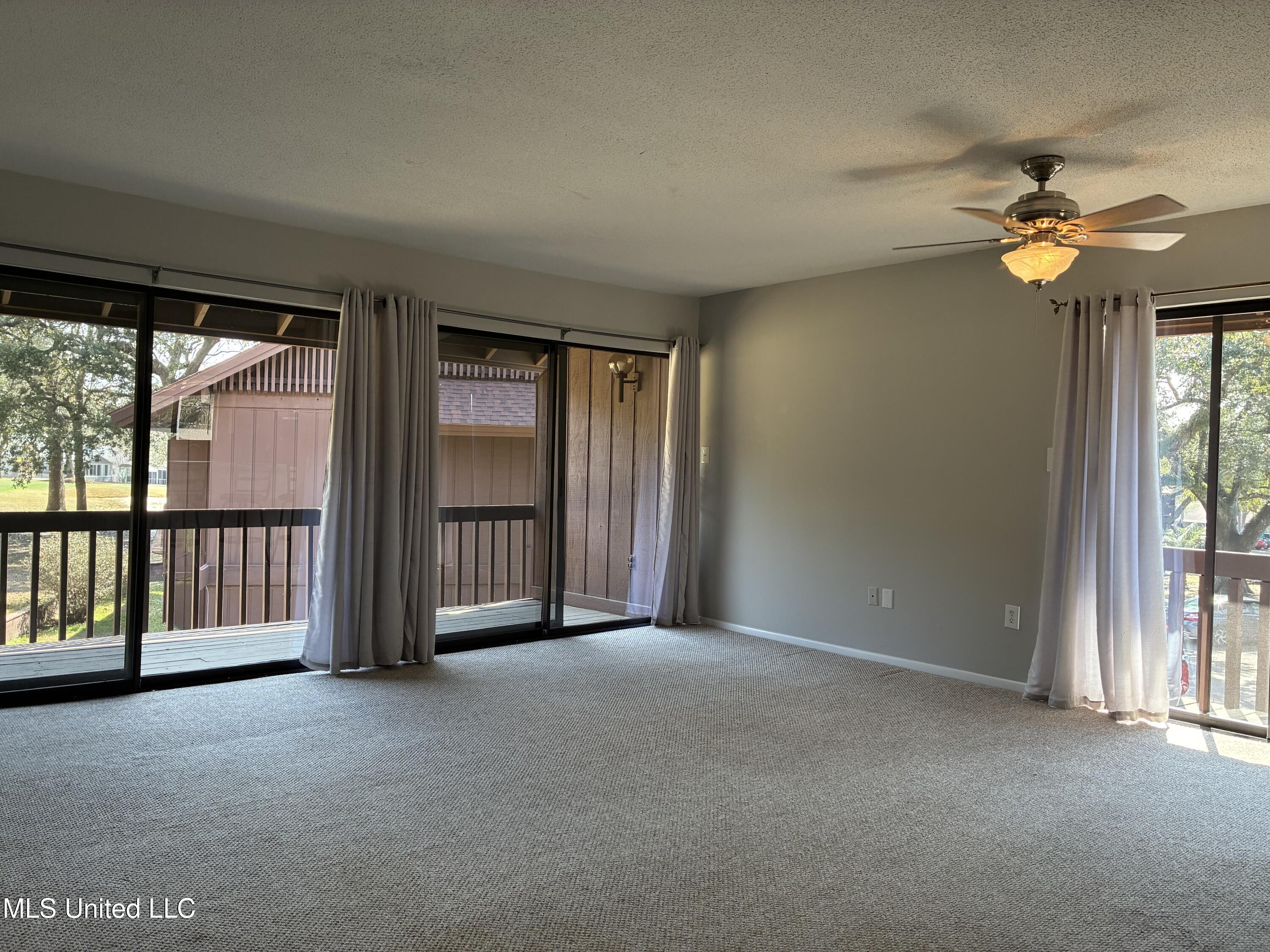 208 Molokai, Unit B Diamondhead, MS 39525 - Photo 4 of 14 IMG_8220