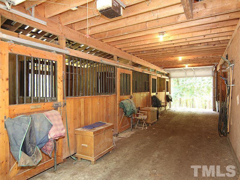 233 Markham Plantation Apex, NC 27523 - Photo 22 of 25 a living room with furniture