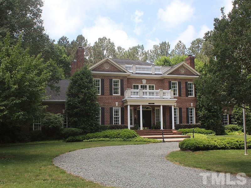 233 Markham Plantation Apex, NC 27523 - Photo 25 of 25 front view of a house with a yard