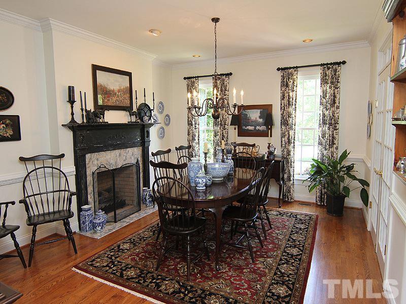 233 Markham Plantation Apex, NC 27523 - Photo 6 of 25 a view of a dining room with furniture