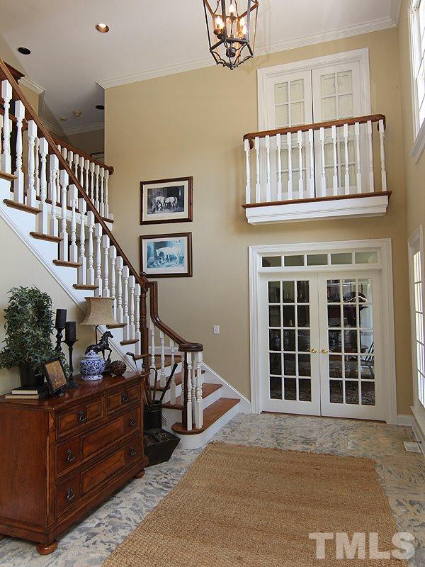 233 Markham Plantation Apex, NC 27523 - Photo 9 of 25 a living room with furniture