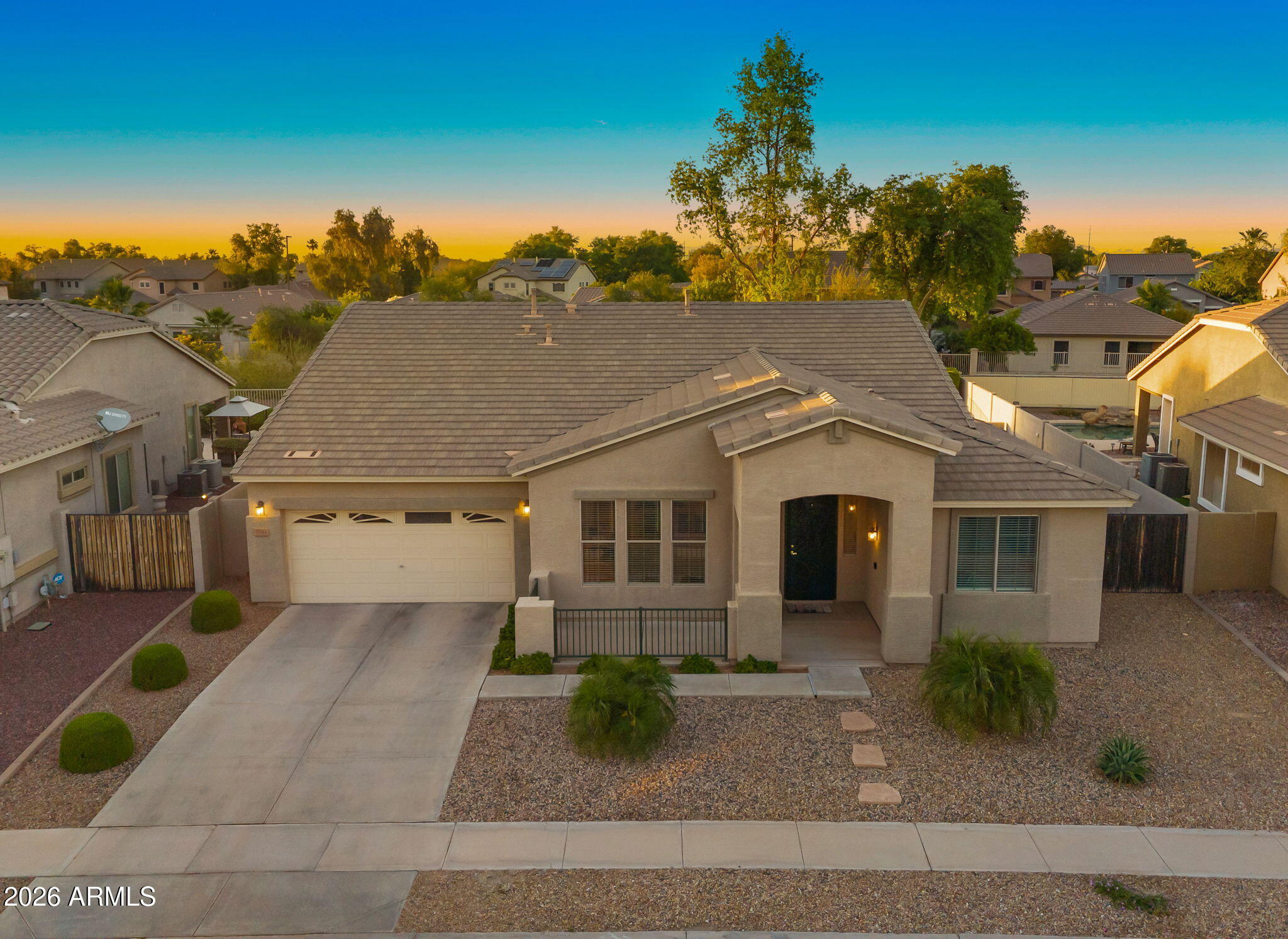 3344 East Hopkins Road Gilbert, AZ 85295 - Photo 3 of 32 front view of a house with a yard