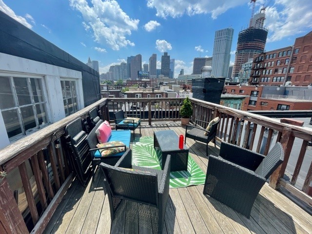 17 Thacher Street, Unit 3 Boston, MA 02113 - Photo 24 of 24 a view of a balcony with seating space