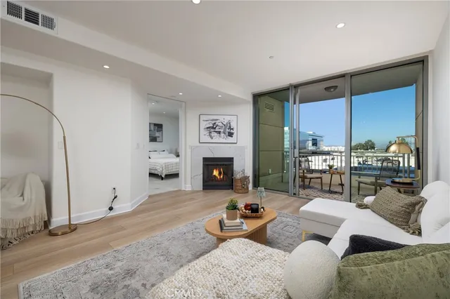 a kitchen with cabinets and appliances