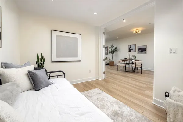 a living room with furniture and a rug