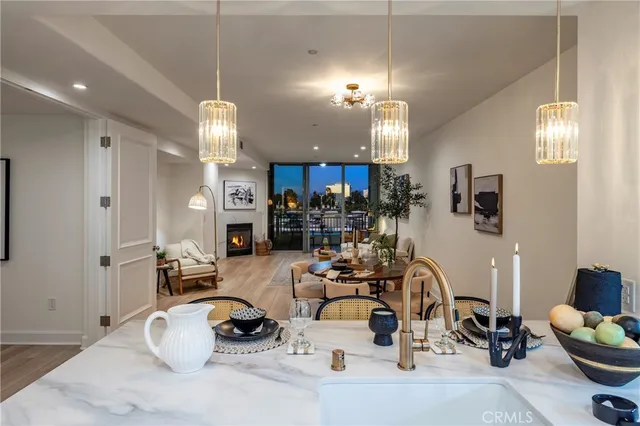 a view of a chair and table in the patio