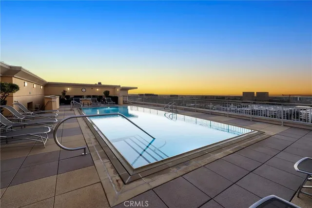 a view of a patio with couches table and chairs