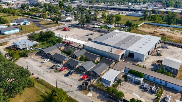 an aerial view of a city with lots of residential buildings