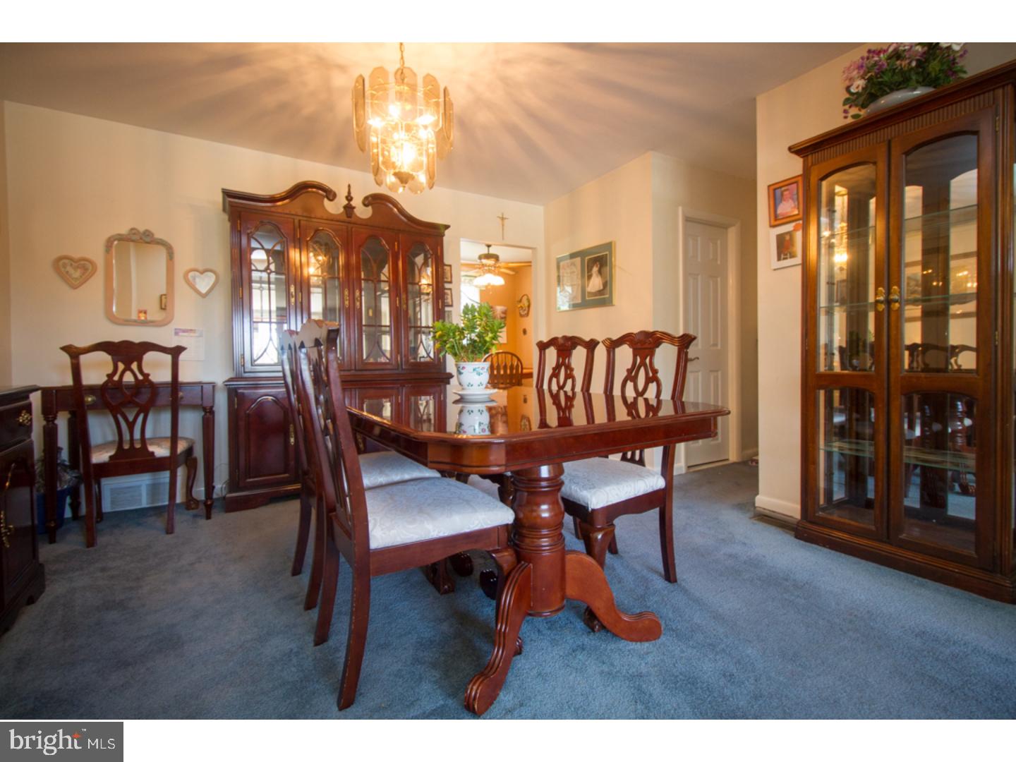 3269 Comly Road Philadelphia, PA 19154 - Photo 8 of 25 a view of a dining room with furniture and chandelier