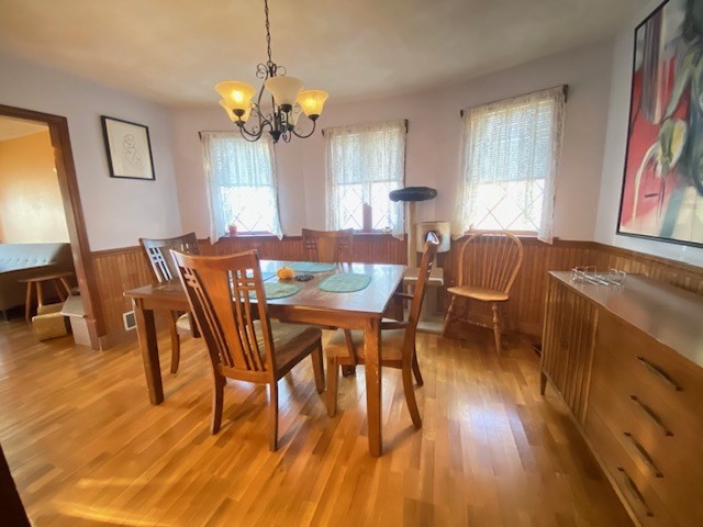 248 Shute Street Everett, MA 02149 - Photo 11 of 35 a view of a dining room with furniture and wooden floor