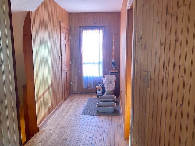248 Shute Street Everett, MA 02149 - Photo 17 of 35 a view of a bedroom with a bed and wooden floor