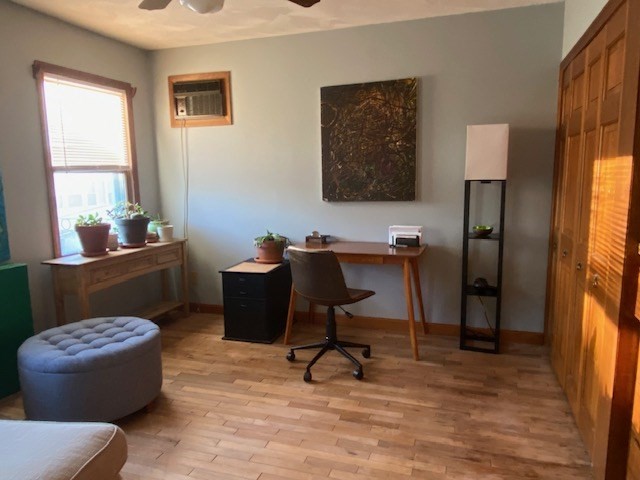 248 Shute Street Everett, MA 02149 - Photo 18 of 35 a view of a workspace with furniture and a window