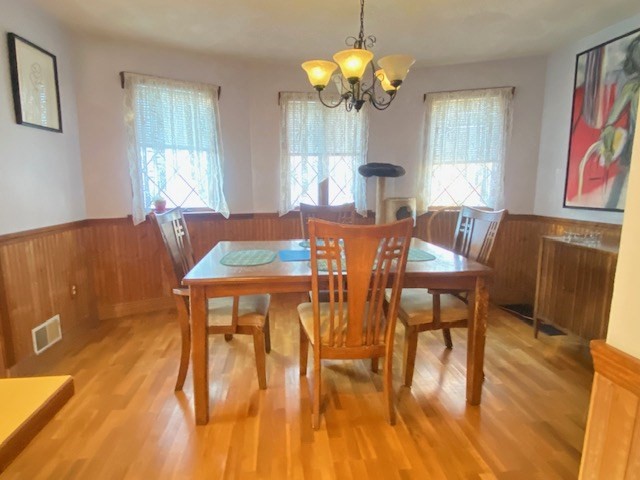 248 Shute Street Everett, MA 02149 - Photo 6 of 35 a view of a dining room with furniture and wooden floor