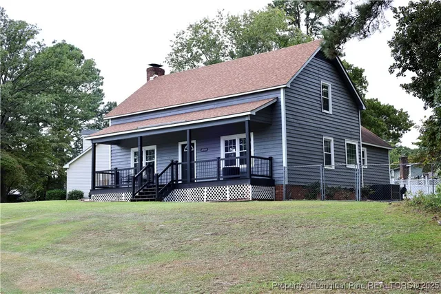 a house view with a garden space