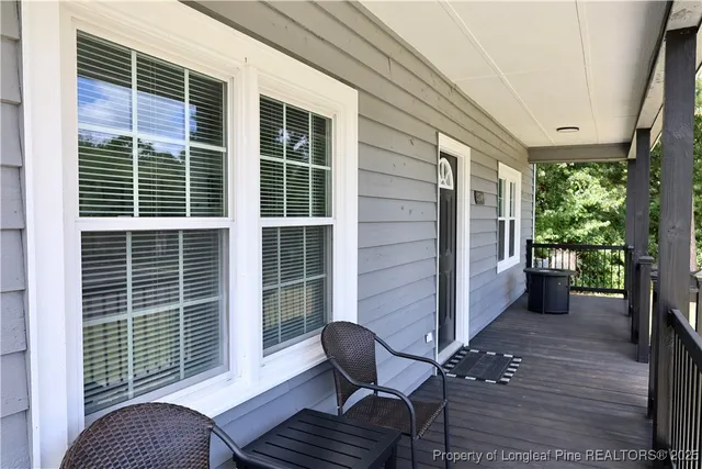 a view of balcony and with potted plants