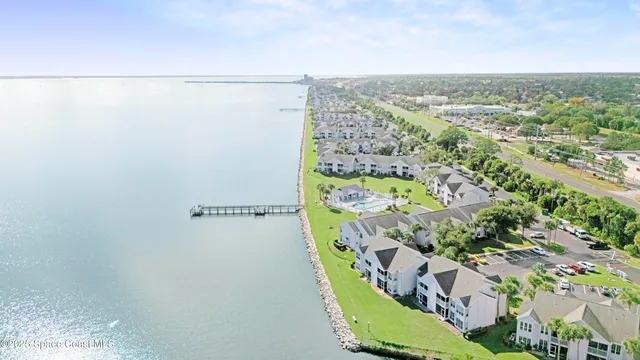 a view of a swimming pool with a balcony