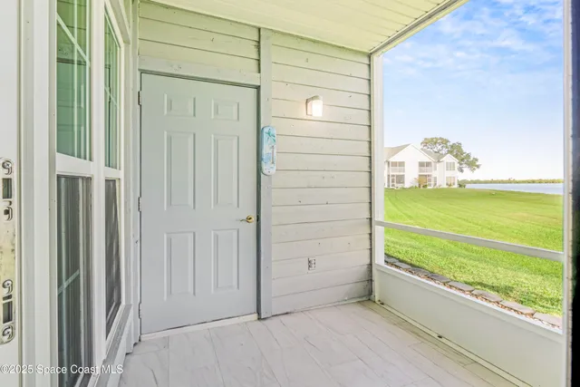 a view of a room with rack and wooden floor
