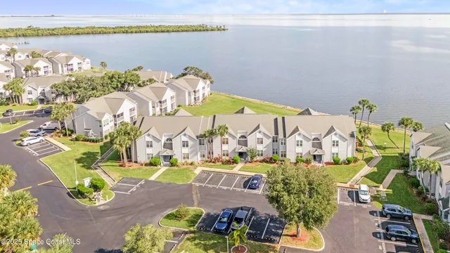 a view of swimming pool with outdoor seating space
