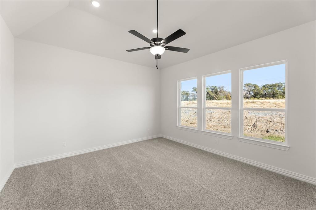 317 Slimp Bluff Azle, TX 76020 - Photo 15 of 25 a view of a livingroom with a ceiling fan and window